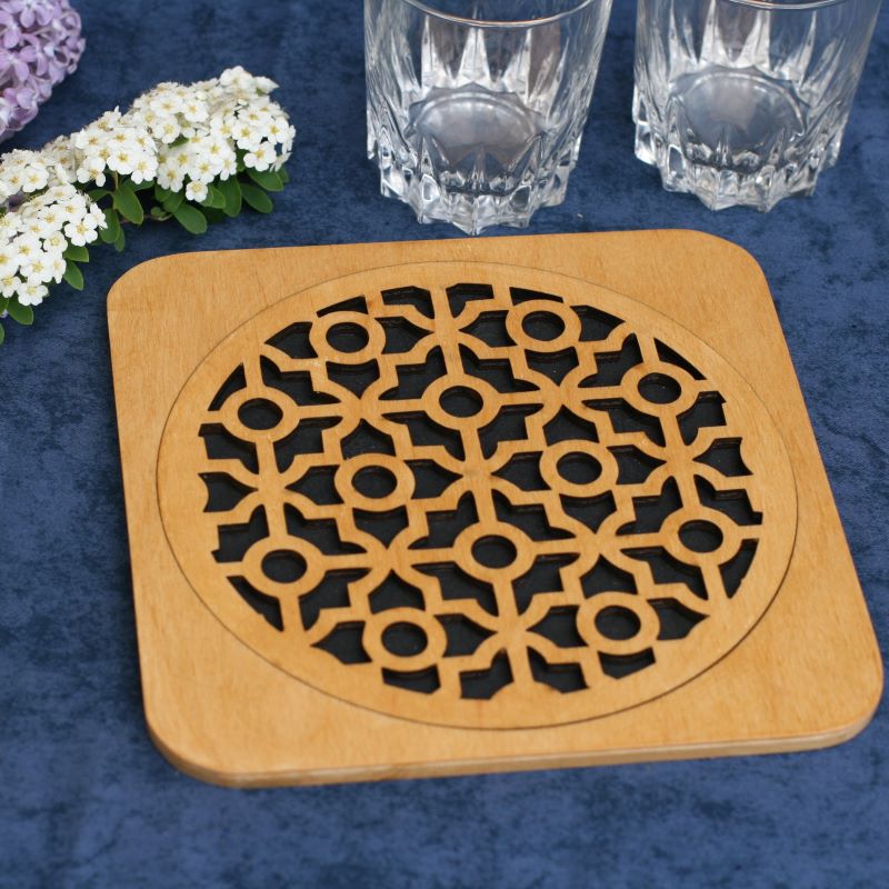 Dessous de plat en bois à motif géométrique